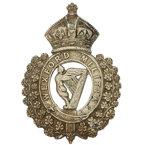 60 - Irish Wexford Militia Victorian glengarry badge circa 1874-81.  Good very scarce die-stamped white m... 