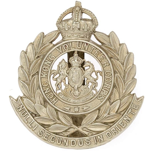 131 - Hong Kong Volunteer Corps cap badge circa 1908-19  Good scarce die-stamped white metal crowned title... 
