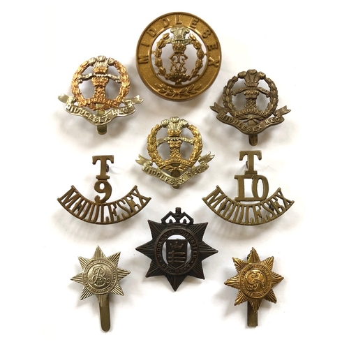 143 - 9 Middlesex badges / shoulder titles.  Helmet plate centre ... cap badge ... 1916 brass economy cap ... 