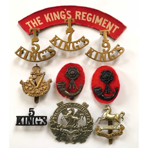 155 - 10 Kings Liverpool Regiment items of insignia.  Cap badges : pre 1926 ... 6th Bn on loops ... 6th Bn... 