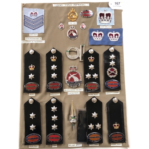167 - Royal Papua and New Guinea Constabulary 20 items of police insignia.  Board with good display of met... 