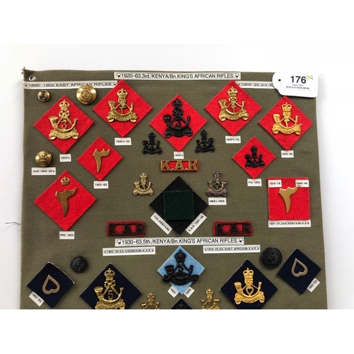 176 - 3rd and 5th Kenya Bns. Kings African Rifles 54 items of insignia.  Board with good display of metal ... 