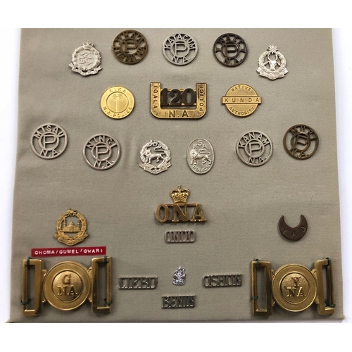 189 - Nigeria Native Administration 36 items of insignia.  Board with good display of metal and cloth badg... 