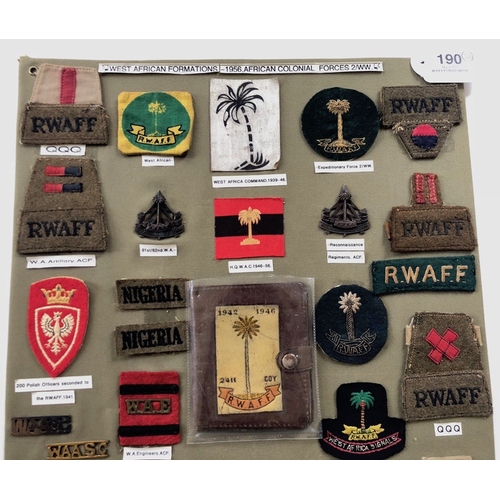 190 - West African Formations 33 items of insignia.  Board with good display of metal and cloth badges. Mo... 