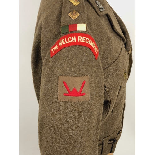 303 - Welsh Regiment 53rd Division Battledress Blouse and Cap.  This blouse is tailored with Welsh Regimen... 