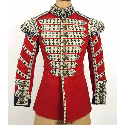 306 - Grenadier Guards 1926 dated Bandsmans tunic.  Scarlet woollen cloth with dark blue facings to the cu... 