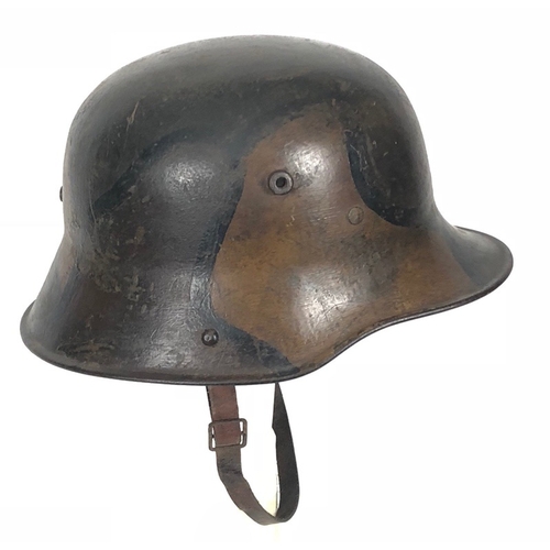 447 - Imperial German WW1 Camouflage Steel Helmet.  A good and scarce example with camouflaged painted fin... 