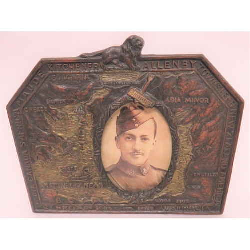 131 - Two WW1 Period Decorative Frames
cast bronzed spelter, rectangular frames with oval photo mounts. &n... 