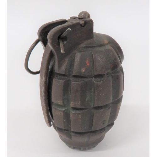 134 - British WW2 Period Inert No 36 Mills Hand Grenade
cast steel fragmentation body.  Top filling alloy ... 