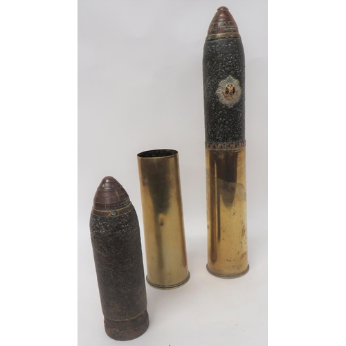 138 - Two WW1 Dated Inert British 18pr Shells
consisting brass case.  The base dated 1915.  Steel head wit... 