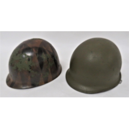 167 - Post November 1944 American M1 Helmet
dark green, rough texture shell.  The brim with rear seam.  Hi... 