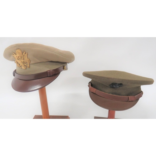 176 - Two American Caps
consisting USMC khaki service dress cap.  Brown leatherette peak.  Brown... 