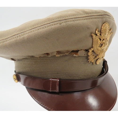 176 - Two American Caps
consisting USMC khaki service dress cap.  Brown leatherette peak.  Brown... 