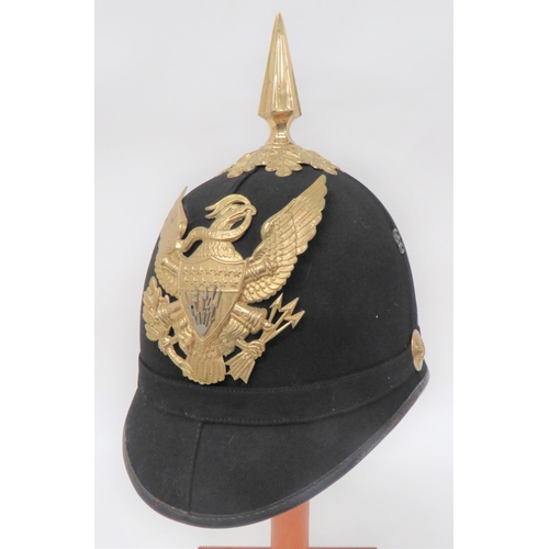American Electrical Sergeant Of Artillery Helmet C1899-1902
black felt, four panel crown with rounded peak and rear brim. Leather edging.  Gilt oak leaf crown mount with gilt spike.  Brass Artillery side mounts.  Brass eagle Artillery plate with central white metal electrical flashes.  Leather sweatband.  Crown with 1900 Inspection stamp.   