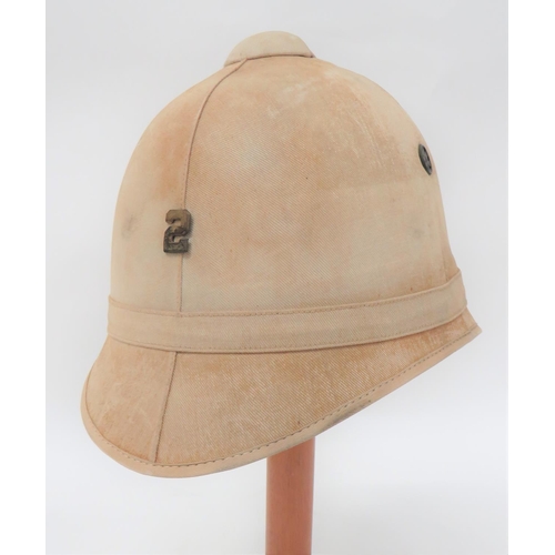 186 - American Foreign Service Helmet
white cotton, four panel crown with rounded peak and rear brim. &nbs... 