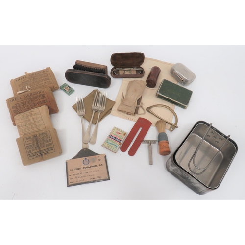 Quantity Of British Military Personal Equipment
including alloy mess tin dated 1945 ... 3 x forks, 1945 ... Sewing kit ... Alloy soap dish, 1945 ... Spectacles for wear in gas masks ... Khaki handkerchief ... Shaving equipment ... 2 x shell dressings ... 2 x first field dressings ... 2 x issue brushes.  Quantity.