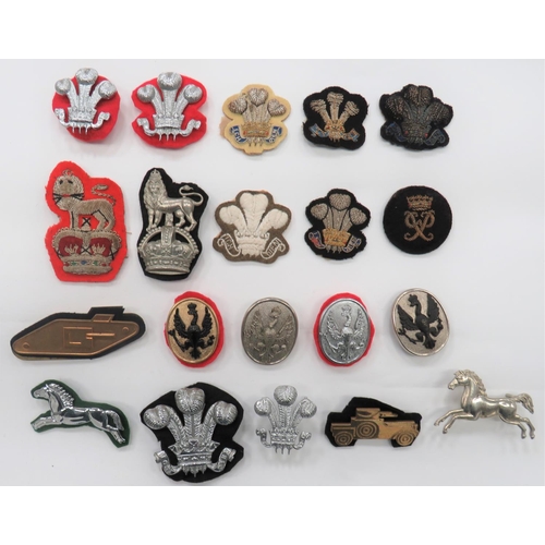 20 Items of Cavalry Arm Badges
including chrome Prince Of Wales plumes ... Brass RTR ... Bullion embroidery QC 15/19H ... Gilt and blackened KRH ... Chrome and blackened 14/20 H ... White metal KC Royals  ... Chrome RDG ... Various Prince Of Wales plumes.  20 items.