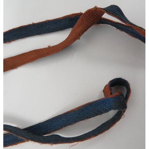 367 - WW2 Japanese Sword Knot
blue and brown silk cord and lower double tassels.  