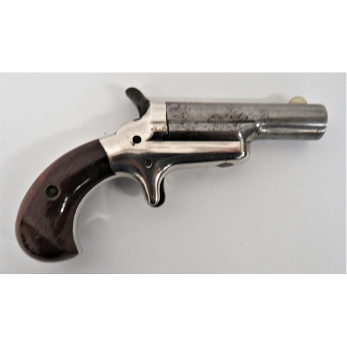 385 - Obsolete Calibre Colt Derringer 
2 1/2 inch, .41 rim fire, side swing out barrel.  White m... 