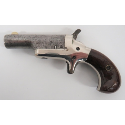 385 - Obsolete Calibre Colt Derringer 
2 1/2 inch, .41 rim fire, side swing out barrel.  White m... 