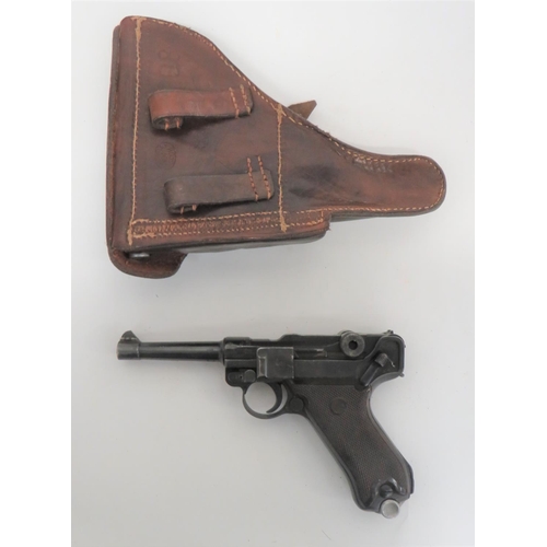 393 - Deactivated WW2 Dated German Luger And Holster
9 mm, 4 inch, blued barrel with front blade sight.  B... 