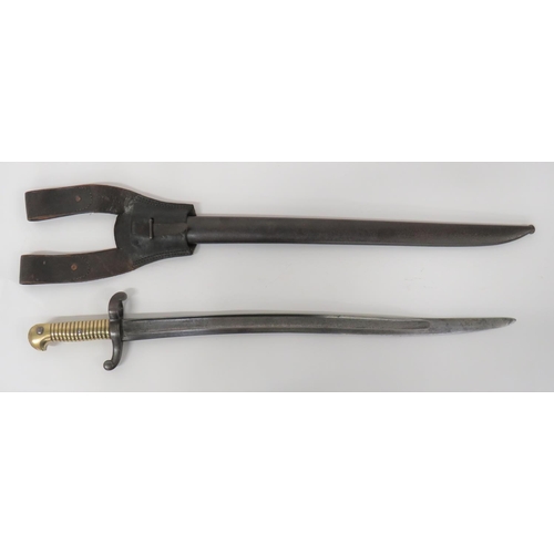 French M1842/59 Sabre Bayonet
22 1/2 inch, single edged, yataghan blade with wide fuller.  Back edge with maker details dated 1864.  Steel, turn up crossguard and large muzzle ring.  Brass ribbed grip.  Contained in its steel scabbard.  Complete with leather frog.  