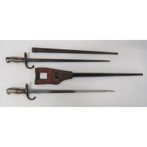 448 - Two French M1874 Gras Bayonets
20 1/2 inch, single edged, T section blades.  Back edges with ma... 