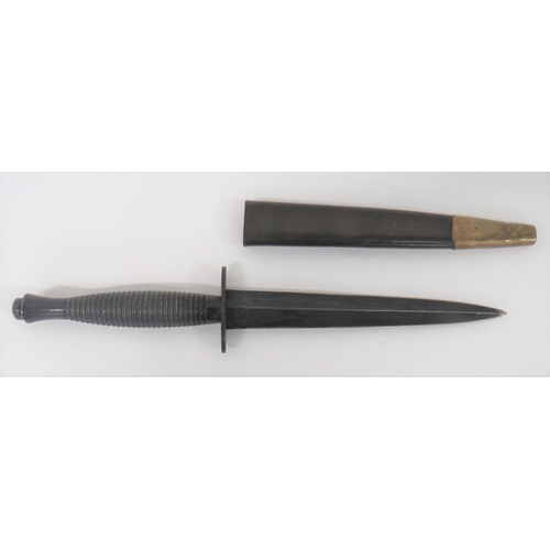 467 - Third Pattern Fairbairn & Sykes Fighting Knife
6 3/4 inch, double edged, blackened blade.  ... 