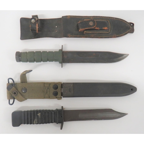 470 - Two Post War Combat Knives
consisting 7 inch, single edged, clipped point blade.  Steel crossgu... 