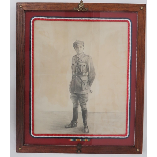 WW1 Pencil Study Of A Royal Artillery Officer
21 x 17 inch, full length study of an Officer wearing his service dress uniform and cap.  WW1 medal trio to the base.  Contained in a glazed oak frame bearing a brass RA cap badge and collar badge. 