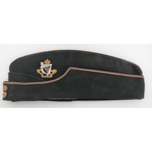 Pre 1952 8th Kings Royal Irish Hussars Orderly Room Staff F/S Cap
green melton crown, body and curtain with gilt piping.  Two front, brass General List buttons.  Bi-metal KC 8th Kings Royal Irish Hussars badge.  Silk lining with linen sweatband.  