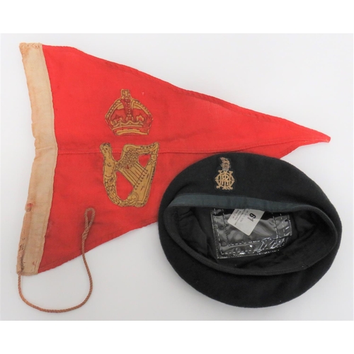 Queens Royal Irish Hussars Beret And Tank Pennant
consisting green woollen beret with lower green silk band.  Bullion embroidery QC entwined letters surmounted by a royal crown.  Black cotton lining ... Red cotton pennant with overlaid printed Kings crown over Irish harp.  Some wear. 2 items.