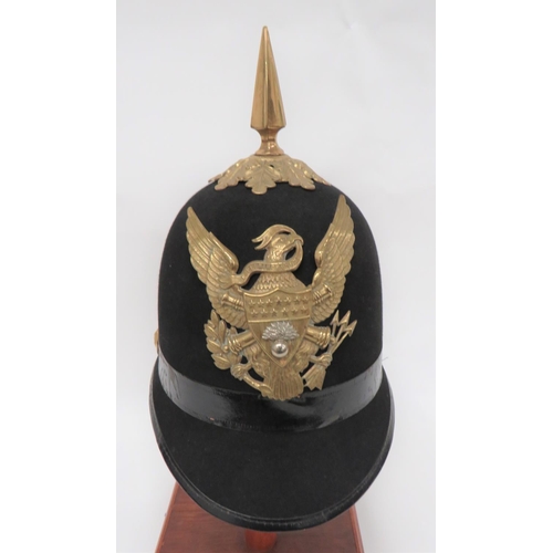 United States Ordnance Corps Sergeant's Dress Helmet C1881
black felt, single panel crown with rounded peak and rear brim.  Leather edging.  Black patent crown band with brass flaming grenade side mounts.  Brass oak leaf crown mount with brass spike.  Brass American eagle Artillery badge with central, white metal, flaming grenade.  Leather sweatband.  