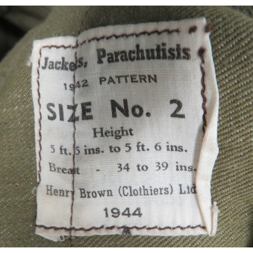 279 - 1944 Dated Parachutist's Jump Over Jacket
green denim, full front zip, sleeveless over jacket.  ... 