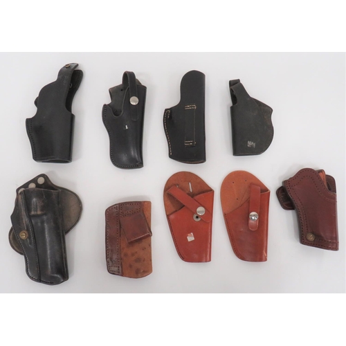 286 - Nine Various Open Top Revolver Holsters
consisting 5 x black leather examples ... 4 x brown leather ... 