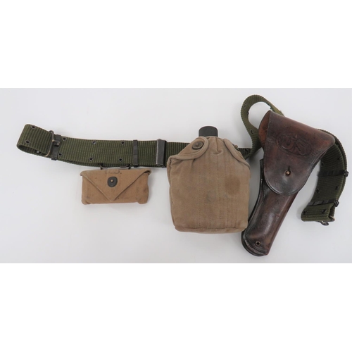 295 - WW2 Dated Colt 1911 Auto Holster And Equipment
dark brown, polished leather holster.  The front... 