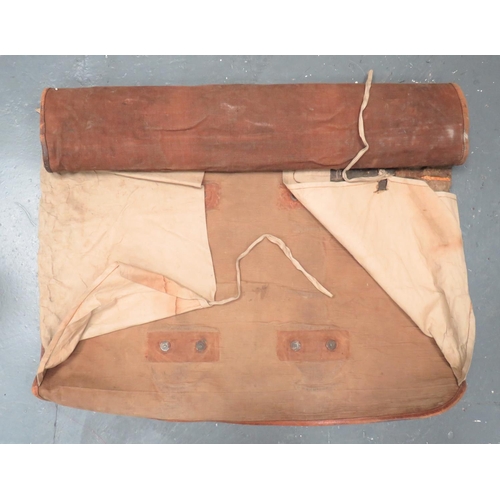 297 - WW1 Period Officer's Campaign Bed Roll
brown canvas roll with leather edging.  Internal rubberi... 