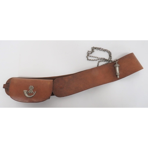 Victorian Period Rifle Volunteers Cross Belt And Pouch 
brown leather, rectangular box pouch with tin insert.  Full front flap with white metal strung bugle.  White metal side securing rings.  Brown leather cross belt fitted with white metal lion mask, chains, whistle and whistle mount.  Traces of Victorian badge absent. 