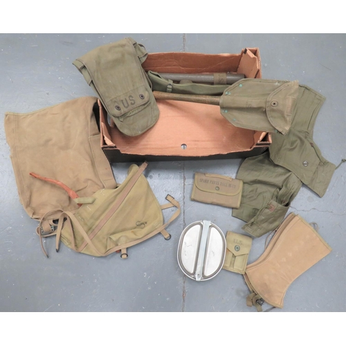 304 - WW2 American Webbing Equipment
including folding head shovel in canvas cover dated 1944 ... Pick axe... 