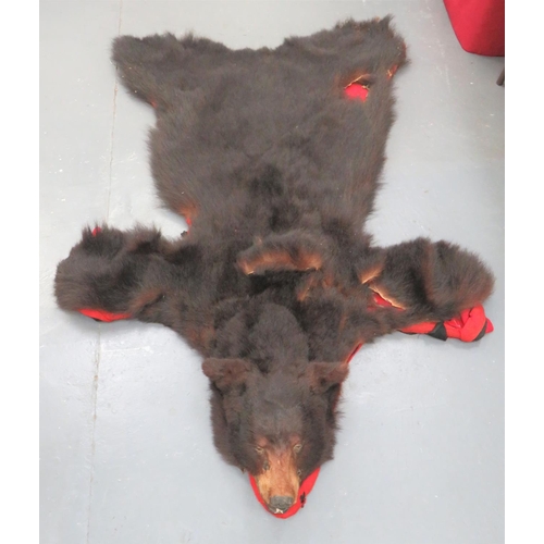 440 - Vintage Taxidermy Bearskin Rug
well done head.  Flat rug body.  Some damage.  Now mou... 