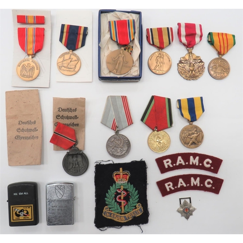 10 Various Medals Including German & American
including German Russian Front ... USA medals include Vietnam ... Meritorious Service ... Marine Corps Reserve Service ... WW2 Victory (in issue box).  Together with 2 x Vietnam Zippo lighters.  