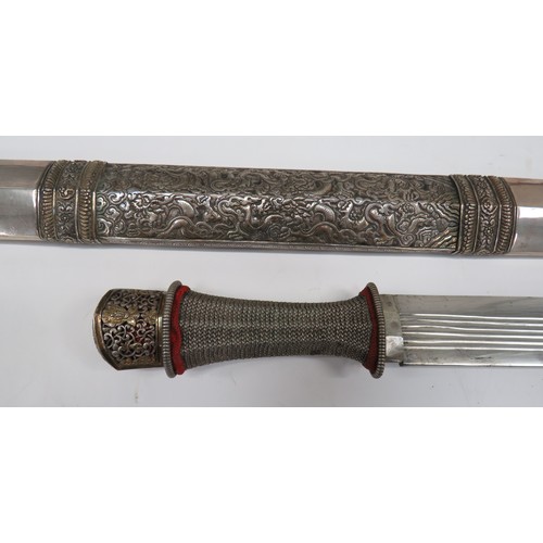 442 - Ornately Decorated Burmese Dha Sword
26 1/2 inch, single edged blade with rounded point.  Six narrow... 