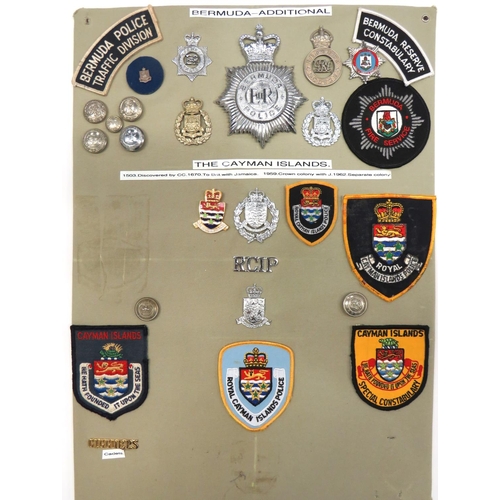 104 - 20 x Bermuda And Cayman Islands Police Badges
including white metal, KC Bermuda Police ... Chrome, Q... 