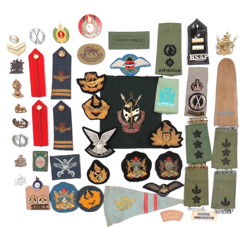 105 - 54 x Rhodesian And South African Badges
varied selection of loose badges including gilt and bullion ... 