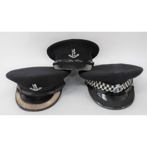 213 - Three Various Warwickshire Constabulary Officer Caps
consisting black crown and body.  Black patent ... 