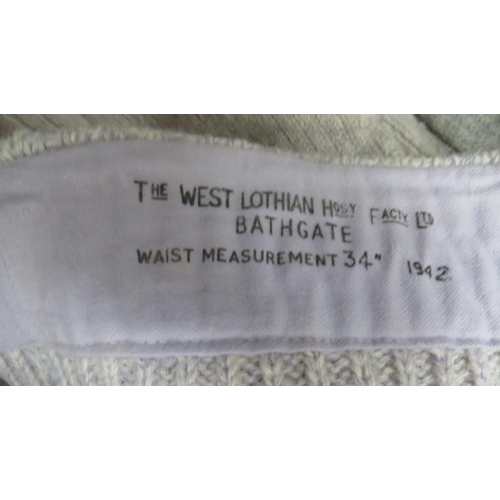 244 - Four Pairs Of WW2 British Long Johns
grey knitted, woollen, long johns underpants.  Tightening panel... 