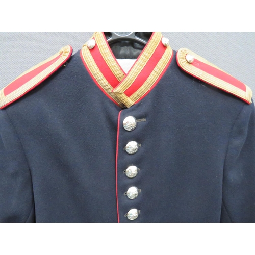 245 - Royal Horse Guards Trooper's Tunic And Mounted Cloak
dark blue, single breasted tunic.  High scarlet... 