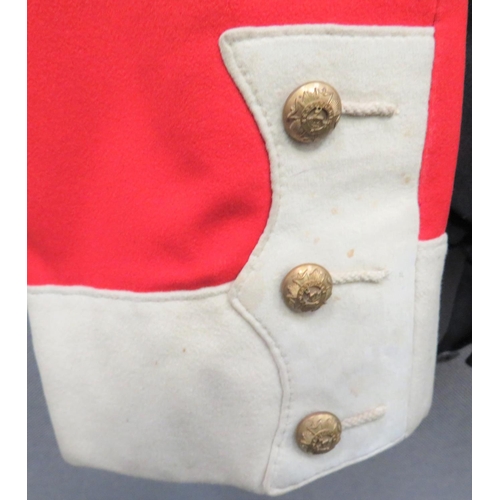 248 - Bedfordshire Regiment Officer's Mess Uniform
scarlet, short mess jacket.  Turn back collar with... 