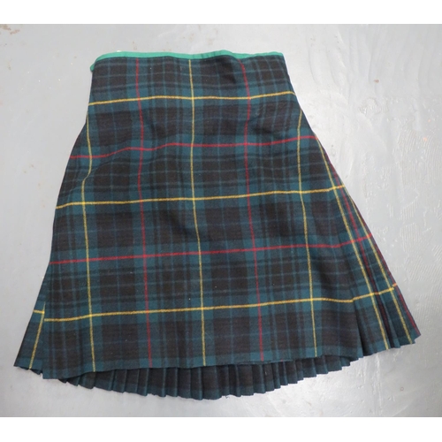 260 - Gordon Highlanders Pattern Kilt
rectangular, tartan, plain wrap over front with pleated rear panel. ... 