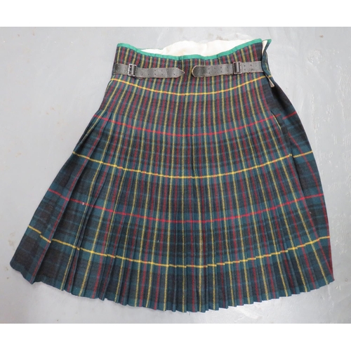 260 - Gordon Highlanders Pattern Kilt
rectangular, tartan, plain wrap over front with pleated rear panel. ... 